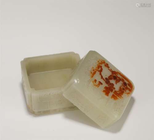 A Carved White and Russet Jade Box with Cover