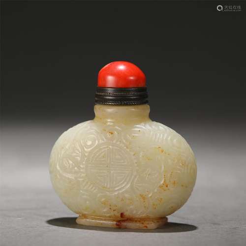 A Carved White Jade Snuff Bottle