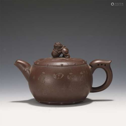 A Yixing Glazed Teapot