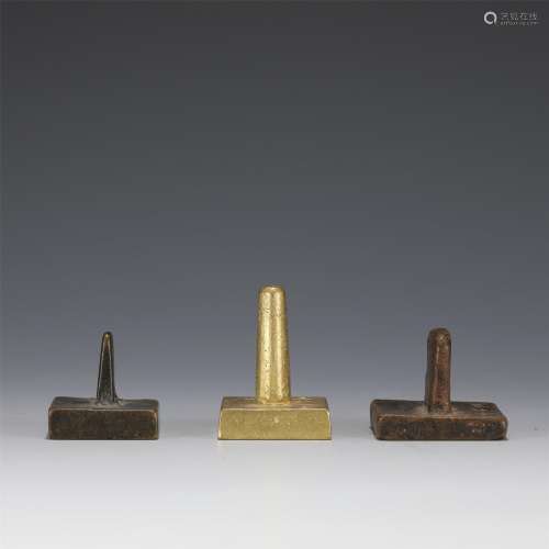 A Group of Three Bronze Seals