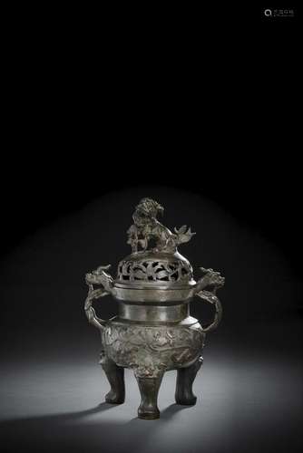 A HEAVY CAST BRONZE TRIPOD LOTUS CENSER WITH PIERCED COVER W...