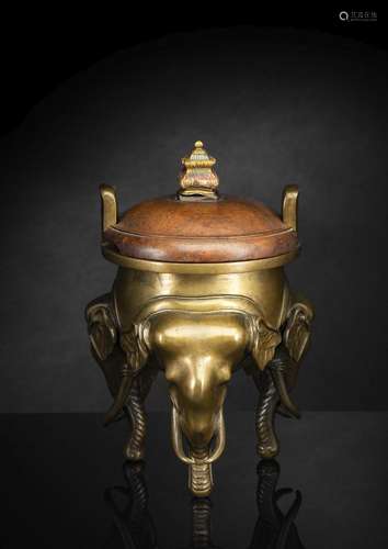 A RARE BRONZE CENSER WITH THREE ELEPHANT FEET AND CARVED ZIT...