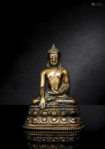 A BRONZE FIGURE OF BUDDHA SHAKYAMUNI