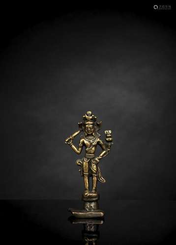 A BRONZE FIGURE OF MANJUSHRI,