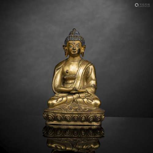 A GILT-BRONZE FIGURE OF BUDDHA SHAKYAMUNI