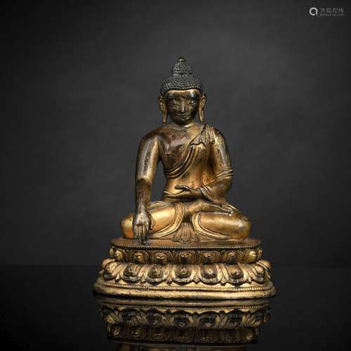 A FINE GILT-BRONZE FIGURE OF SEATED BUDDHA SHAKYAMUNI