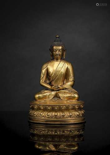 A GILT-BRONZE FIGURE OF BUDDHA SHAKYAMUNI