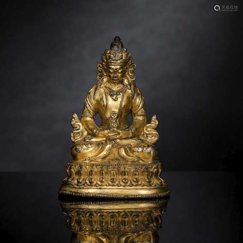 A GILT-BRONZE FIGURE OF AMITAYUS