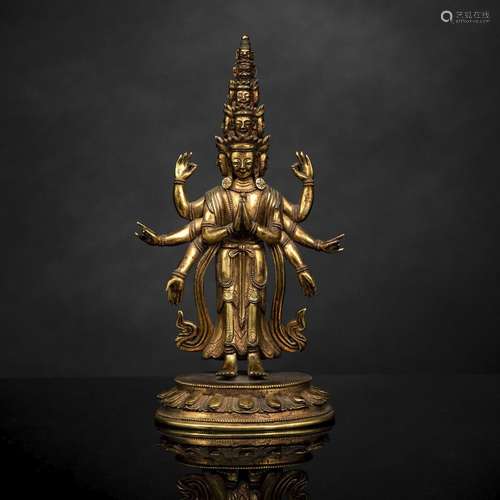 A GILT-BRONZE FIGURE OF EKADASHALOKESHVARA