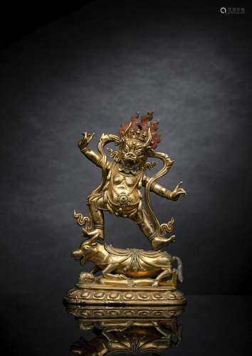 A GILT-BRONZE FIGURE OF YAMA