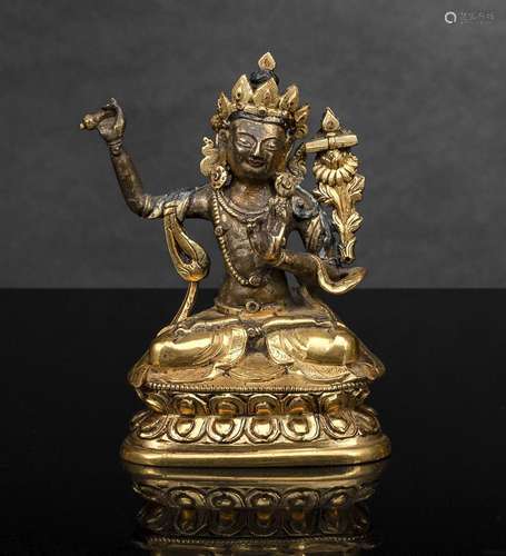 A PART-GILT BRONZE OF MANJUSHRI