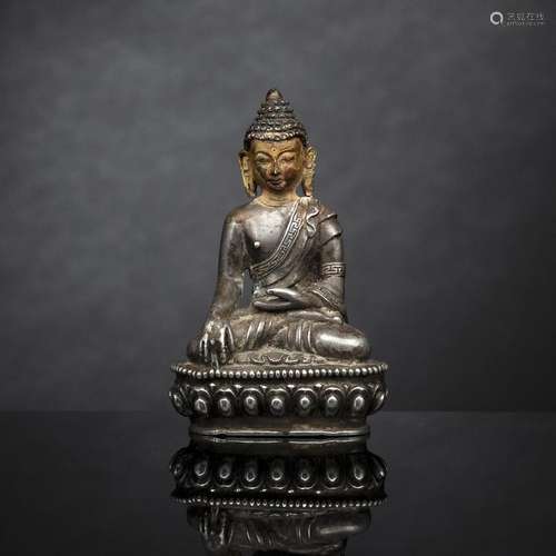 A SILVER FIGURE OF BUDDHA SHAKYAMUNI