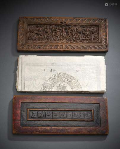 TWO CARVED BOOK COVERS