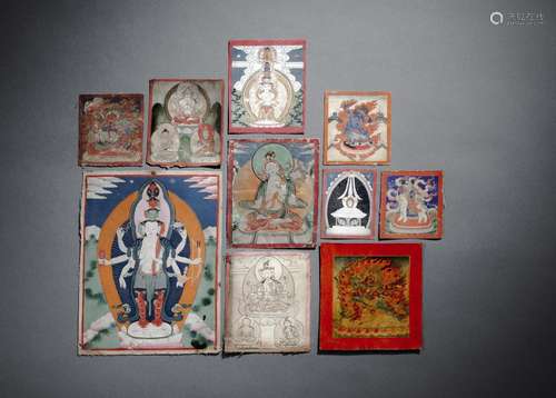 A GROUP OF TEN TSAGLI AND THANGKA