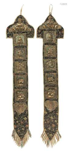 TWO TEXTILE BANNERS SET WITH EACH EIGHT GILT-METAL EMBOSSED ...