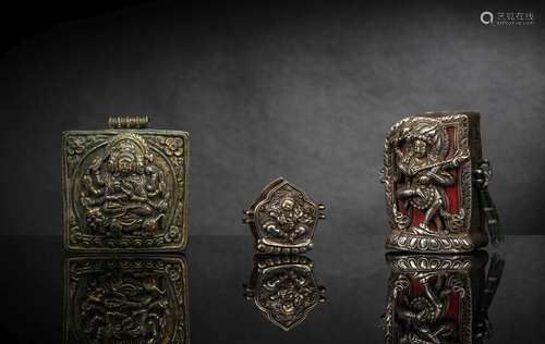 THREE SILVER OR COPPER AMULET-BOXES, GAHU