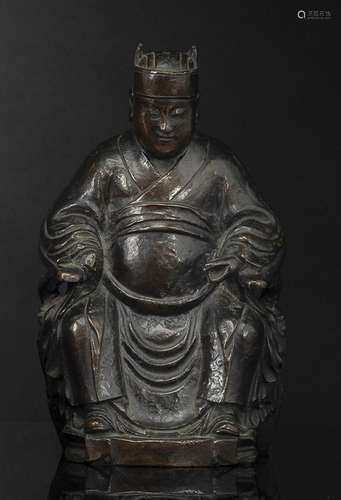 A BRONZE FIGURE OF A DIGNITARY