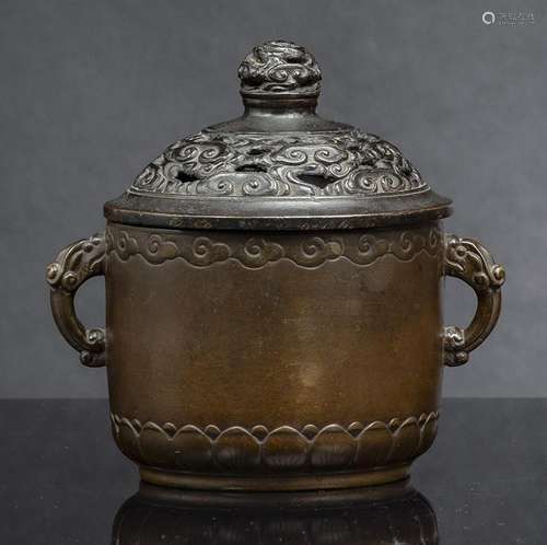 A CYLINDRICAL BRONZE CENSER WITH CLOUD DESIGN AND TWO HANDLE...