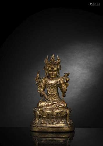 A FINE CAST GILT-LACQUERED BRONZE MODEL OF SEATED GUANYIN ON...