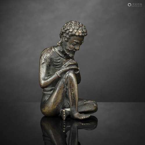 A BRONZE FIGURE OF BODHIDHARMA