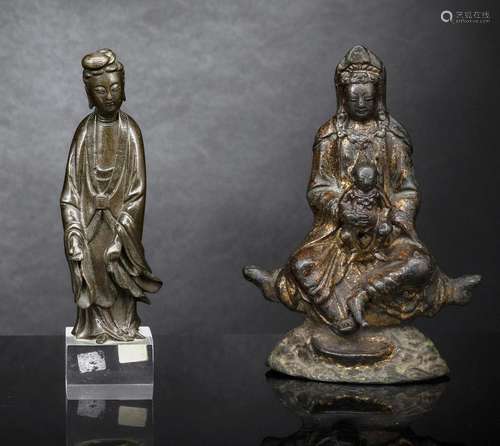 A GILT-LACQUERED BRONZE FIGURE OF GUANYIN AND BOY SEATED ON ...