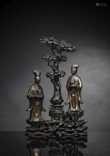 A RARE PART-GILT BRONZE PAIR OF OFFICIALS WITH A CARVED WOOD...