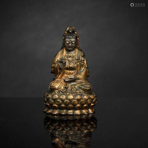 A GILT-LACQUERED BRONZE FIGURE OF SEATED GUANYIN