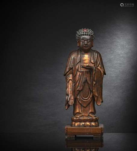 A GILT- AND RED-LACQUERED BRONZE FIGURE OF BUDDHA SHAKYAMUNI