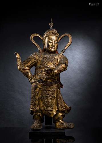 A LARGE GILT-LACQUERED WOOD FIGURE OF WEITUO