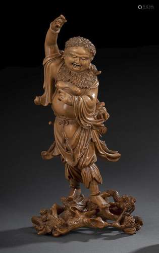 A FINE CARVED BOXWOOD MODEL OF STANDING LIU HAI