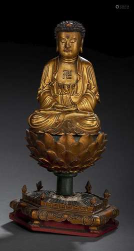 A GILT-LACQUERED WOOD FIGURE OF BUDDHA SHAKYAMUNI SEATED ON ...