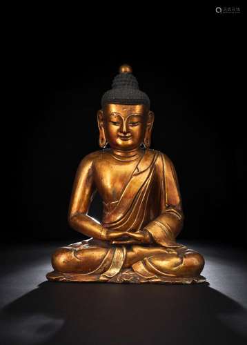 A FINE AND RARE GILT- AND RED-LACQUERED WOOD FIGURE OF BUDDH...