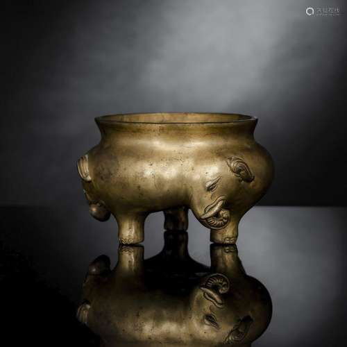 A RARE SHAPED BRONZE CENSER WITH THREE MOLDED ELEPHANT HEADS...