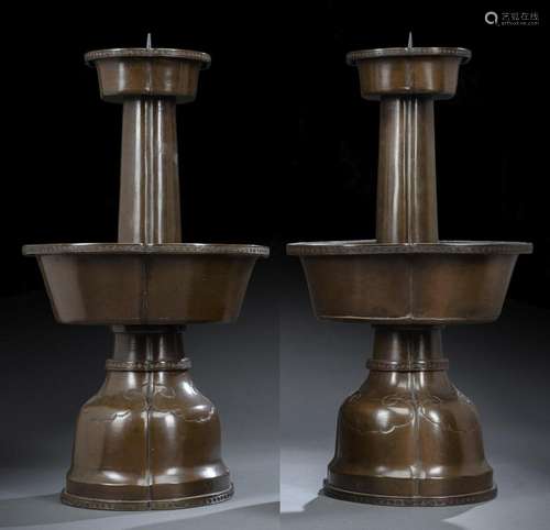 A PAIR OF LARGE BRONZE ALTAR CANDLE HOLDER