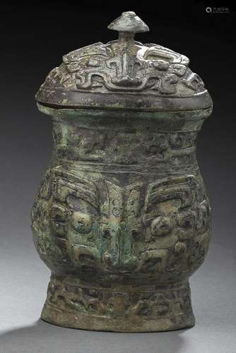 A BRONZE WINE VESSEL 'ZHI' AND COVER IN ARCHAIC ST...