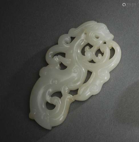 A FINE CARVED LIGHT WHITE-GREEN JADE CHILONG PENDANT