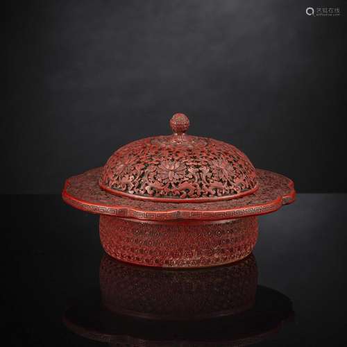 A FINE CARVED CINNABAR LACQUER BOX AND COVER WITH LOTUS