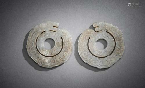 A PAIR OF PENDANTS WITH COILED DRAGONS CHIHU OF GREYISH-GREE...