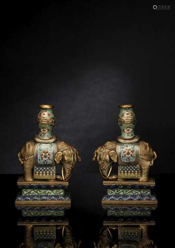 A FINE PAIR OF PART-GILT CLOISONNÉ ENAMEL ELEPHANT INCENSE S...