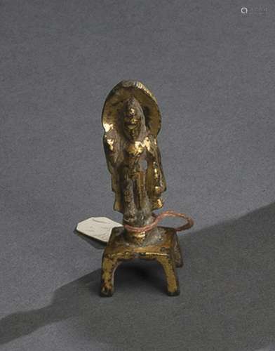 A GILT-BRONZE MINIATURE STELE OF A STANDING BODHISATTVA