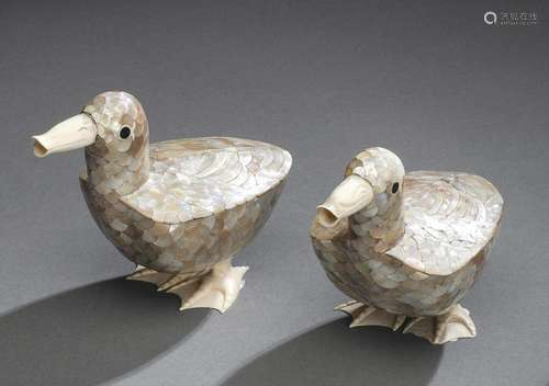 A FINE PAIR OF MOTHER-OF-PEARL AND IVORY MODELS OF STANDING ...