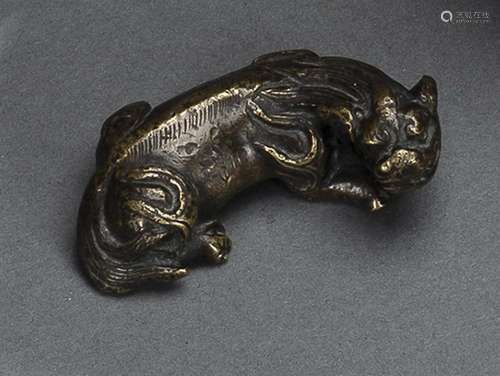 A BRONZE PAPER WEIGHT IN FORM OF A 'XIEZHI'