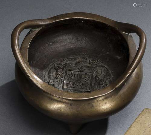 A TWIN-HANDLED BRONZE CENSER