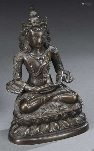 A BRONZE FIGURE OF SEATED AMITAYUS WITH TURQUOISE AND GLASS ...