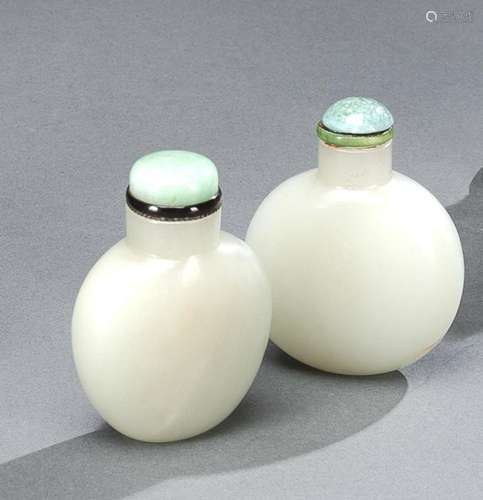 TWO WHITE JADE SNUFFBOTTLES WITH STOPPERS