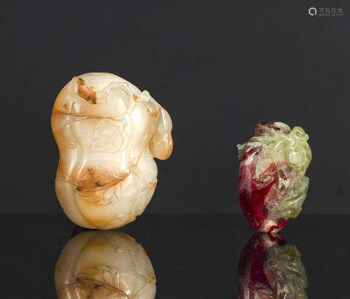 A CARVED GOURD-SHAPED AGATE SNUFFBOTTLE AND A CRYSTAL BOTTLE...