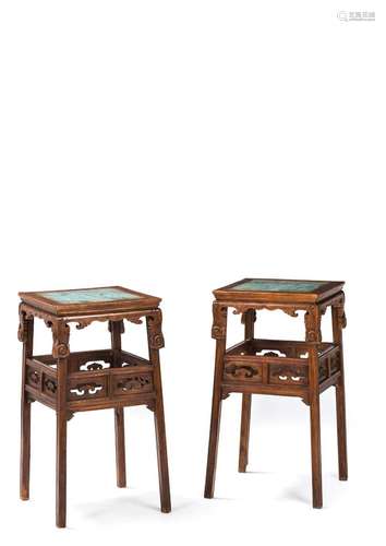 A PAIR OF CARVED HUANGHUALI STANDS WITH INSET STONE TOPS