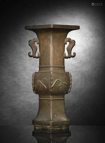 A HEAVY-CAST BRONZE VASE WITH BAMBOO DECORATION AND TWO HAND...