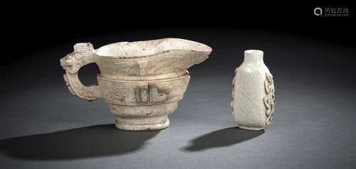 A CHICKENBONE JADE EWER IN ARCHAIC STYLE AND A CHICKENBONE J...