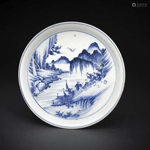 A BLUE AND WHITE PORCELAIN PLATE WITH A PICKNICK SCENE NEAR ...